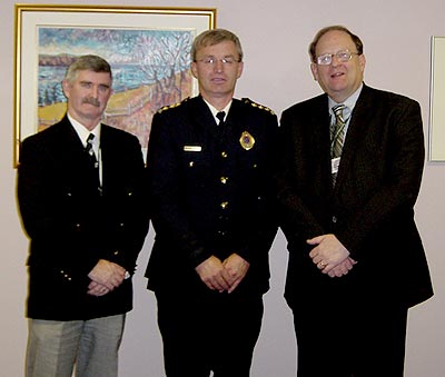 (L-R) Chief of Police Richard Deering; Superintendent William Brown and Minister of Justice and Attorney General Tom Marshall