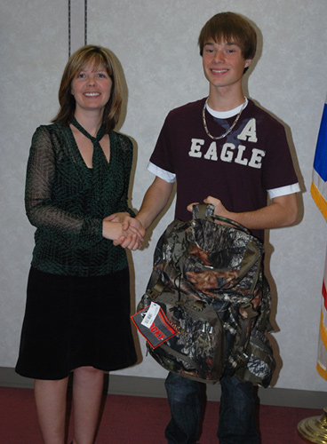 (L-R) Honourable Charlene Johnson Minister of Environment and Conservation and James Humby winner of the 2009 Atlantic Province�s Youth Hunting and Fishing Exchange Program.