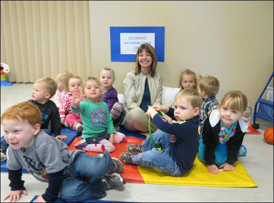 To celebrate National Child Day (Tuesday, November 20), the Honourable Charlene Johnson, Minister of Child, Youth and Family Services, read stories to some children attending a play group hosted by Family and Child Care Connections in Conception Bay South.