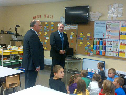 The Honourable Clyde Jackman, Minister of Education, centre, is joined by the Honourable Ross Wiseman, Speaker of the House of Assembly and MHA for Trinity North, during a visit to a Grade 2 class at Riverside Elementary in Clarenville today (Monday, October 1).