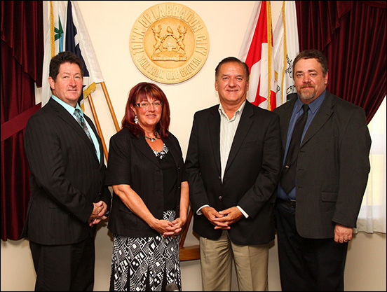 The Honourable Kevin O’Brien, Minister of Municipal Affairs, announced $4.2 million for Labrador West. L-R; Honourable Nick McGrath, Minister Responsible for Labrador Affairs; Karen Oldford, Mayor of Labrador City; Minister O'Brien; and Ron Barron, Mayor of Wabush.