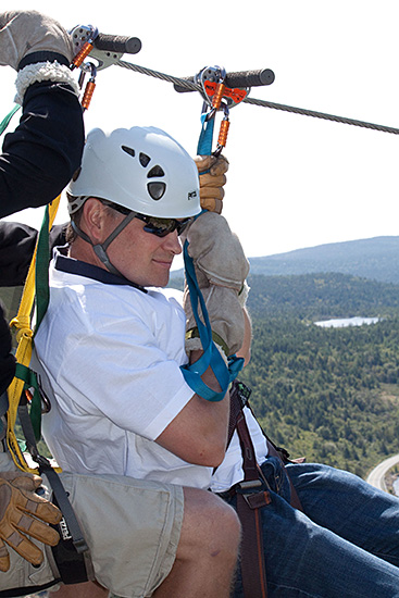 Minister Hutchings saddled in the harness to embark on one of North Atlantic Ziplines 10 stages.