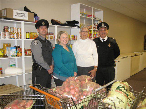 Staff of the Bishop’s Falls Correctional Centre present produce to the Grand Falls-Windsor Bishop’s Falls Community Food Bank. (L-R) Correctional Officer Leonard Murray, Classification Officer Shelley Quinton, Sandra Lewis, Grand Falls-Windsor Bishop’s Falls Community Food Bank, and Lieutenant William Diamond.