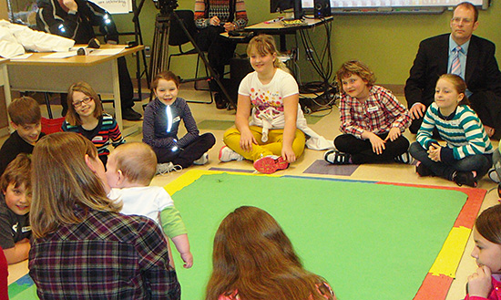 Mount Pearl North MHA Steve Kent was at Holy Trinity Elementary in Torbay on Monday (February 18), on behalf of the Honourable Clyde Jackman, Minister of Education, to take part in a session of the Roots of Empathy program. The Provincial Government announced it is providing $75,000 to the organization to help expand the program into more schools.