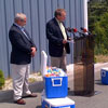 The Honourable Tom Hedderson, Minister of Environment and Conservation and Minister Responsible for the Multi-Materials Stewardship Board (MMSB), right, is joined by Mike Samson, Chief Executive Officer of MMSB, left, at an event congratulating Newfoundlanders and Labradorians for recycling 2 billion beverage containers - July 19, 2013.