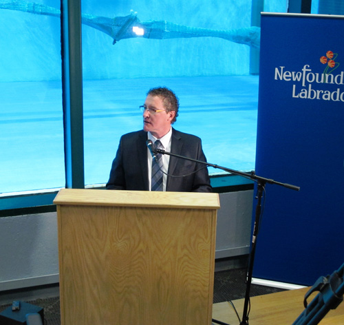 The Honourable Derrick Dalley, Minister of Fisheries and Aquaculture, receiving a demonstration in the Centre for Fisheries Ecosystems Research lab at the Fisheries and Marine Institute. April 15, 2013.