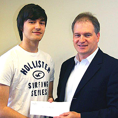 The Honourable Keith Hutchings, Minister of Fisheries and Aquaculture, presents Michael Kennedy with the Department of Fisheries and Aquaculture Scholarship – November 2013