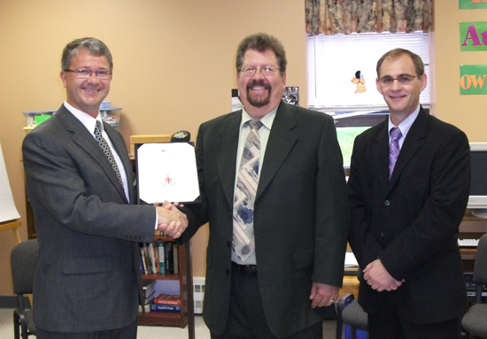 Minister King and Dr. Glassman are joined by Dr. David Dibbon, Associate Dean of the Faculty of Education, Memorial University, who nominated Dr. Glassman for the COF award.