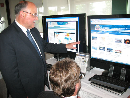 Honourable Ross Wiseman, Minister of Business, with Compusult Limited geospatial portal