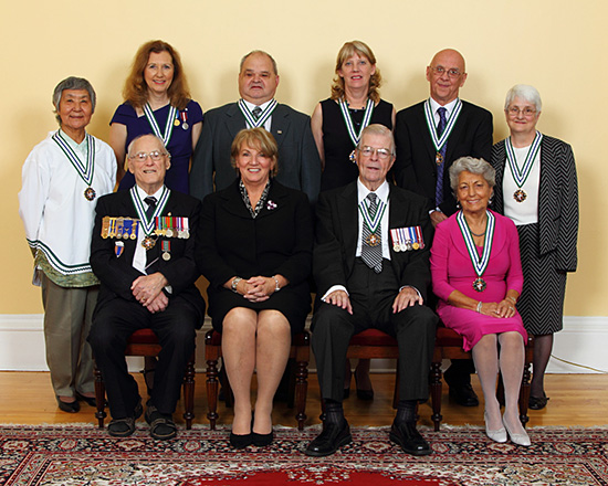 Front Row, L-R: John (Jack) Ford, Premier Kathy Dunderdale, Lieutenant Governor John C. Crosbie, Freida Faour; Back Row, L-R: Susan (Fran) Williams, Mary Dyer Gordon, Captain Sidney Hynes, Constance Howley, Tom Dawe, Janet Cox.