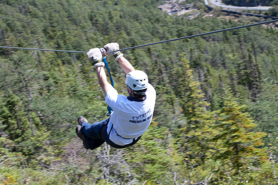 Minister Hutchings zipping through North Atlantic Ziplines.