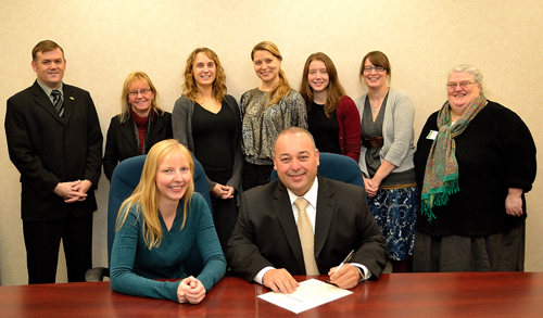 Jenny Seeman, President, Association of Newfoundland and Labrador Archives (ANLA) and The Honourable Terry French, Minister of Tourism, Culture and Recreation, were recently joined by members of ANLA to proclaim November 18 to 24 as Archives Week. From the back left are: Greg Walsh, Director and Provincial Archivist, The Rooms Archives Division; Stephanie Harlick, Outreach Committee member, ANLA; Theresa Walsh, Vice President, ANLA; Colleen Quigley, Chair, ANLA Education Committee; Emily Gushue, Director, ANLA; Nicole Penney, Secretary, ANLA; Mary Ellen Wright, Professional Development and Outreach Officer, ANLA.